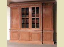 Bookcase with hand carved detail and wire mesh doors